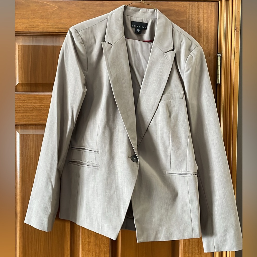 Kasper two-piece jacket and pants suit. So versatile! Get it before it’s gone!